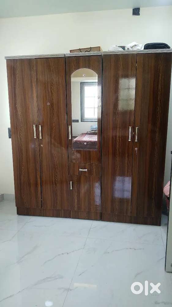 Wooden wardrobe set and double bed for sale