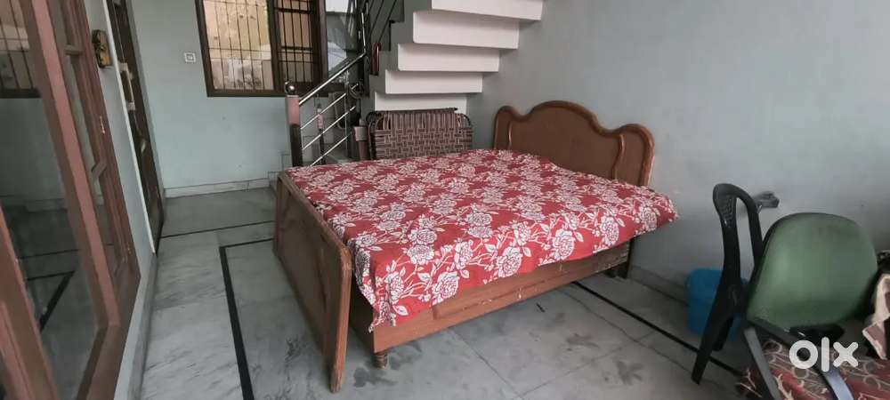Wooden double bed