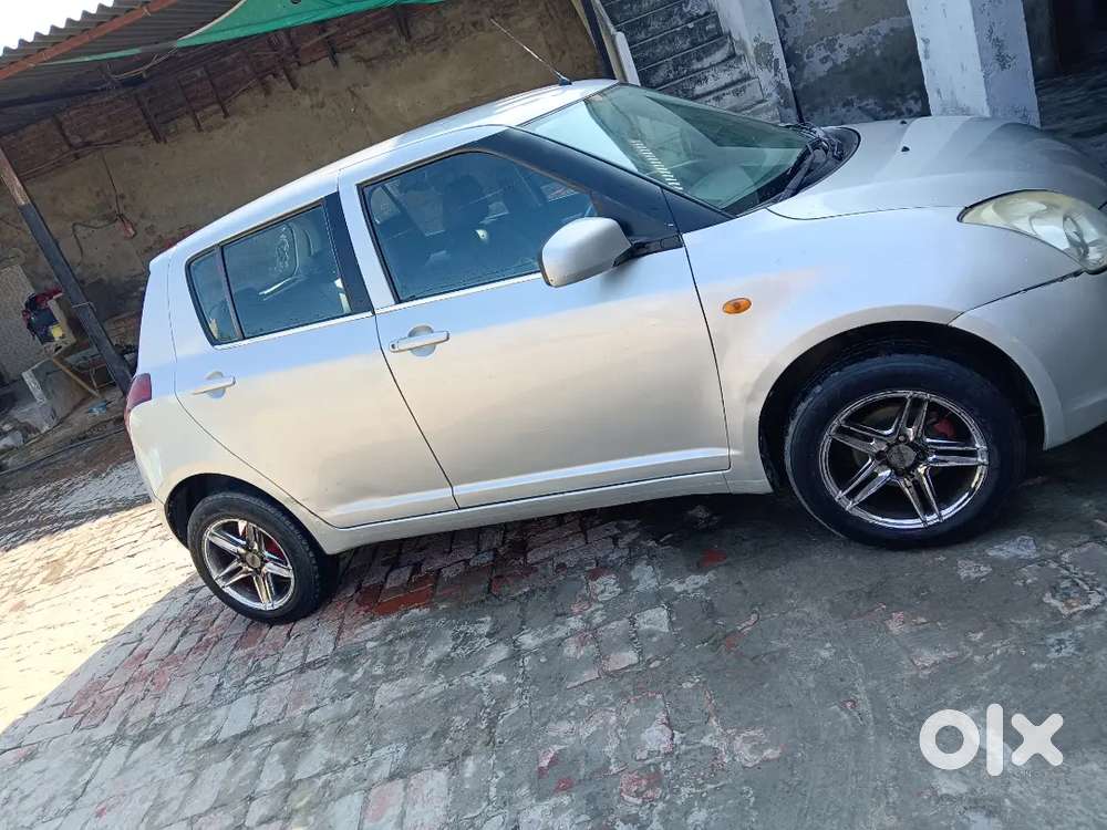 Maruti Suzuki Swift Lxi 2011