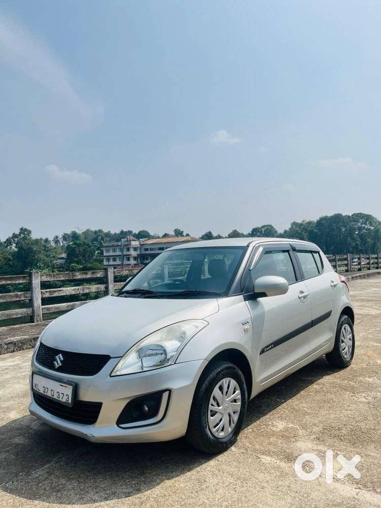 Maruti Suzuki Swift Lxi Optional-o, 2016, Petrol
