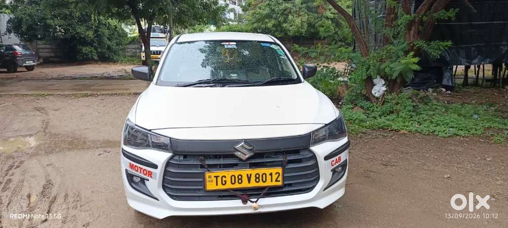 Maruti Suzuki Dzire Tour S 2026. Showroom Track Taxi Plate