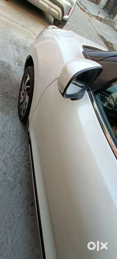 Baleno Zeta White  2019 1 St Owner