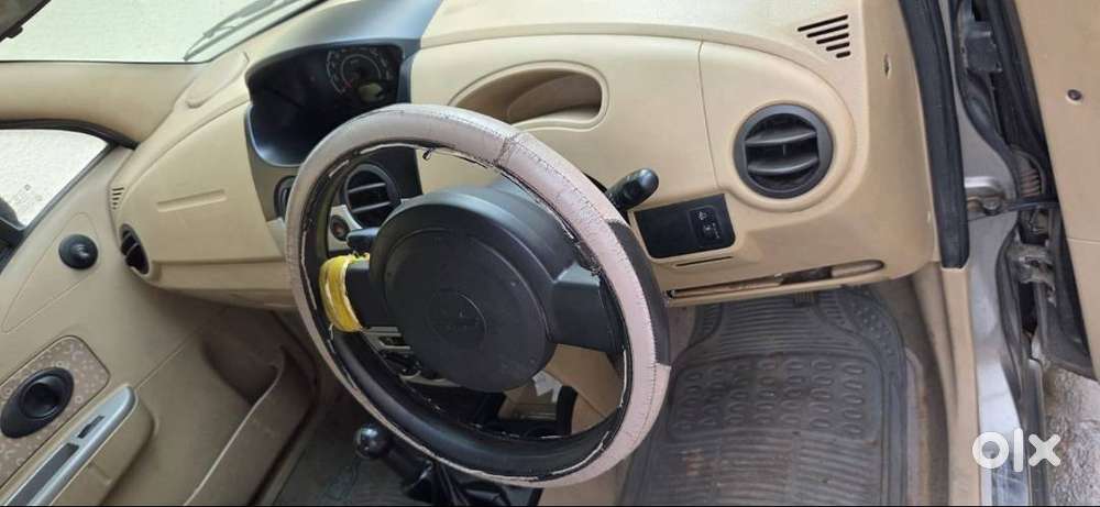 Selling Well Maintained And Less Used Spark Car
