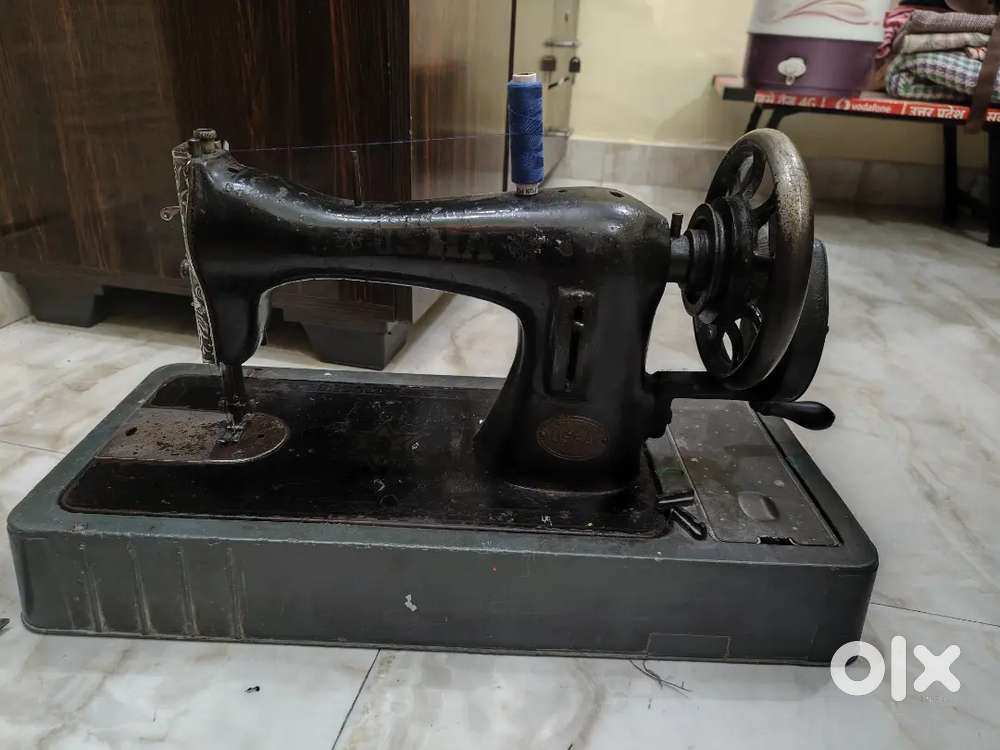 Sewing Machine for sale (Free scissor and stand)