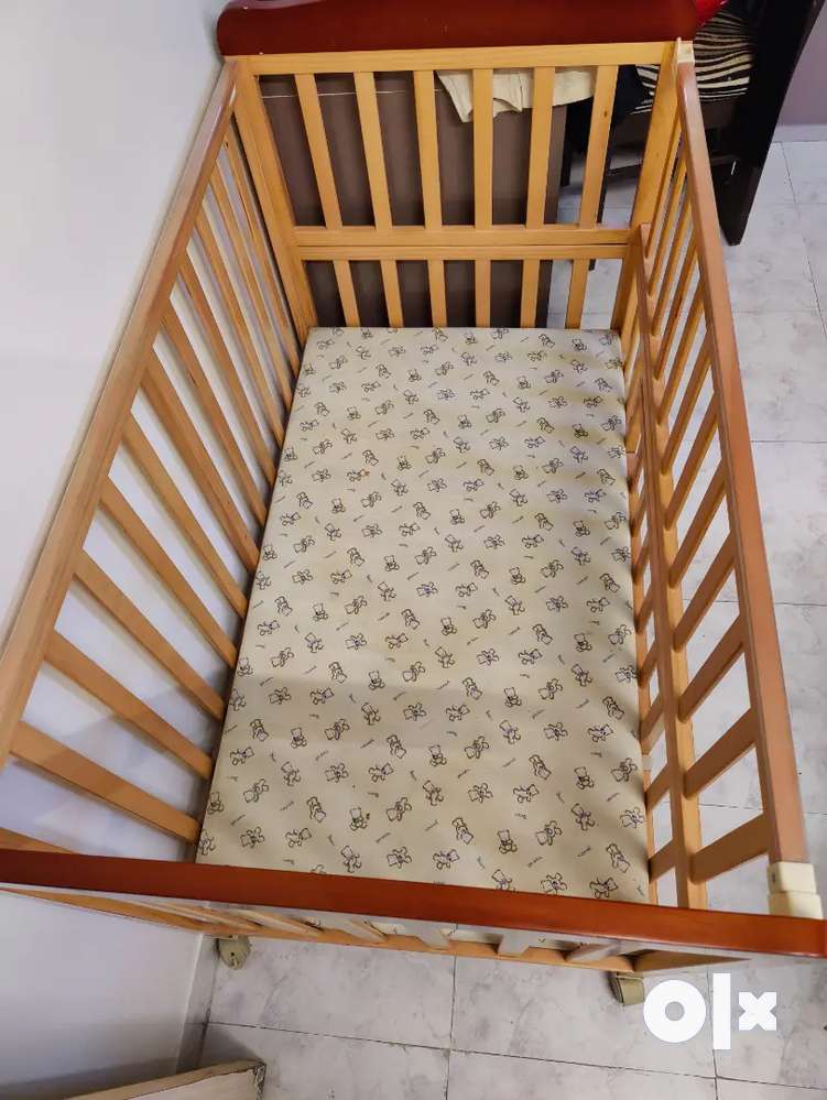 Babyhug hamilton wooden cot sale