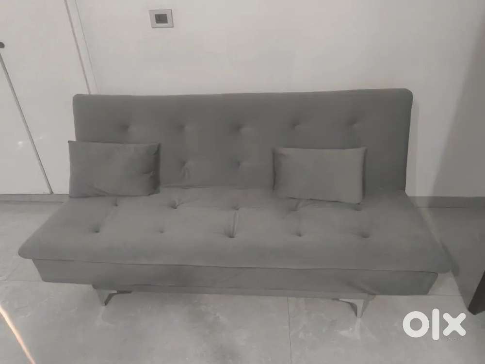 Folding sofa cum bed