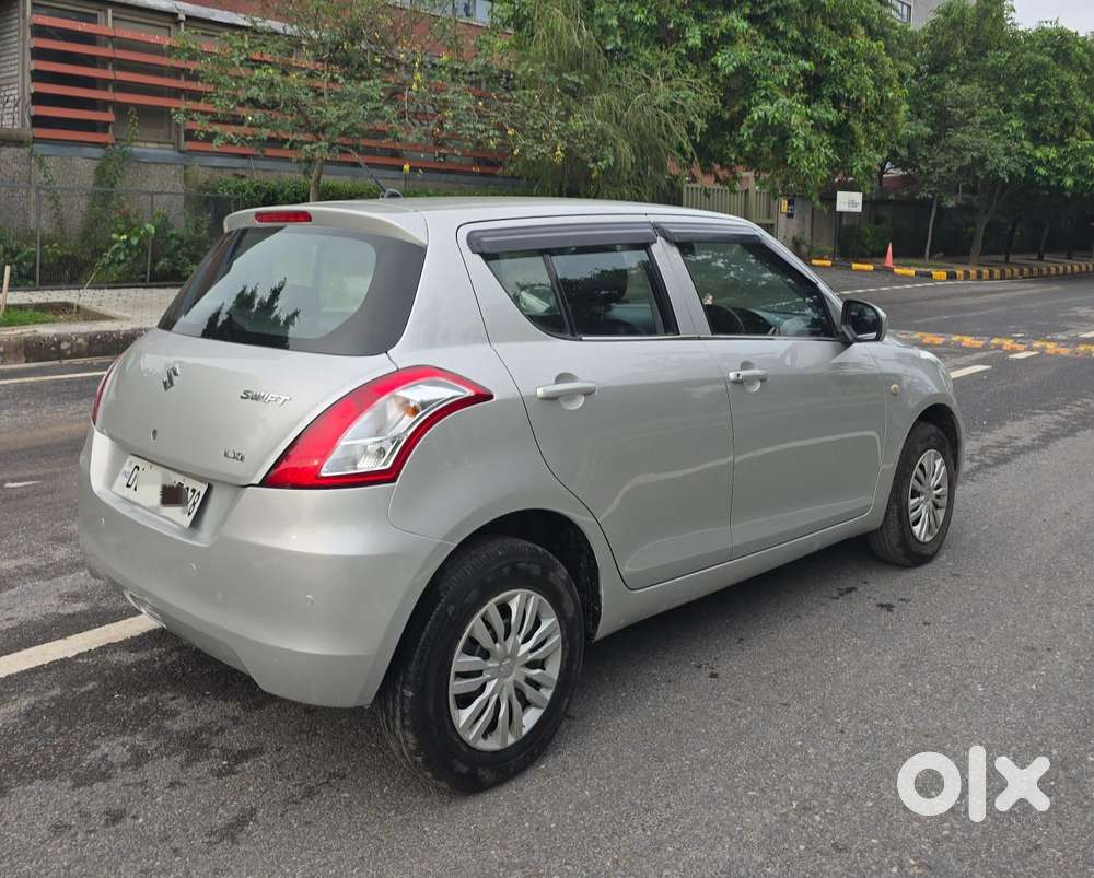Maruti Suzuki Swift Lxi Optional-o, 2015, Petrol