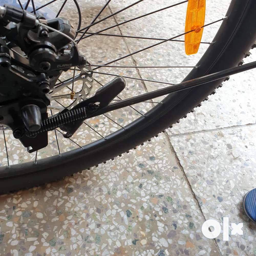 Cycle stand discount for car olx