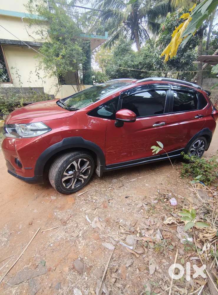 Sunroof, Red & Black Color, Water Proof Covered Seat, Alloy Wheels