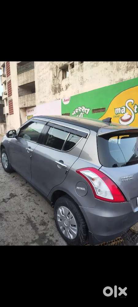 Maruti Suzuki Swift 2015    (11 Month) Petrol Genuine 60000 Km Driven