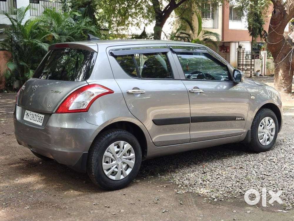 Maruti Suzuki Swift 2011-2014 Lxi, 2012, Petrol