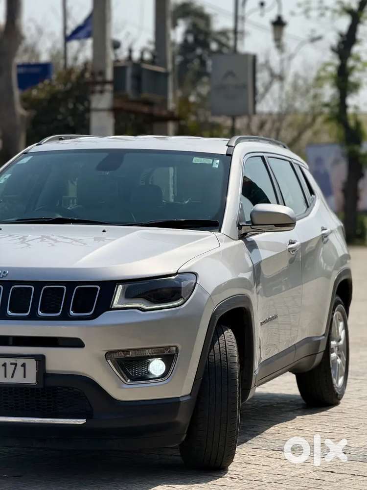 Jeep Compass 4x4 Next To Showroom