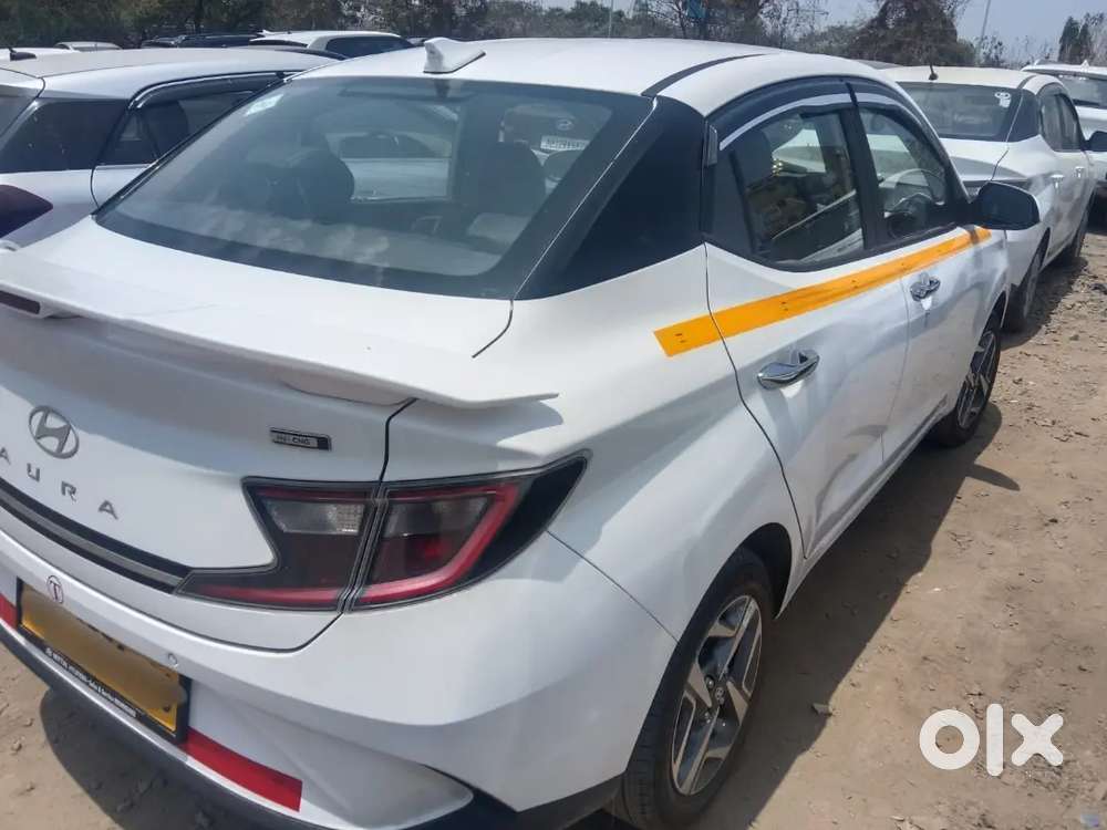 Hyundai Aura Sx Petrol +cng 2026