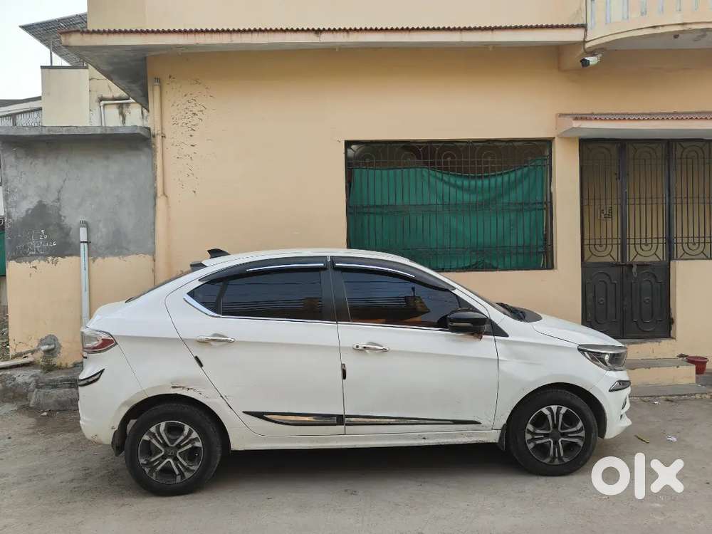 Tata Tigor 2022 Cng & Hybrids 126000 Km Driven Good Condition Company
