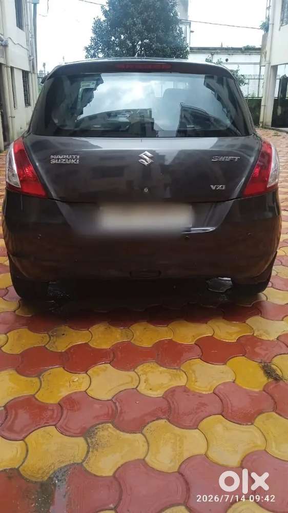 Maruti Suzuki Swift Lxi 2015