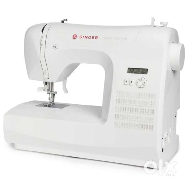 1week used singer multi type masheen