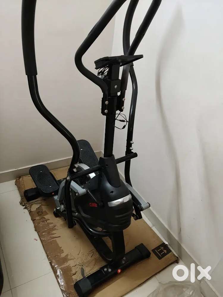 Elliptical climber cross trainer