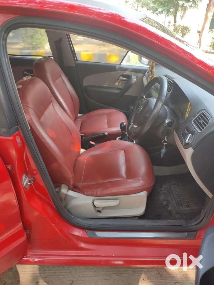 It's A Red Colour Polo With 17 Inchi Alloys