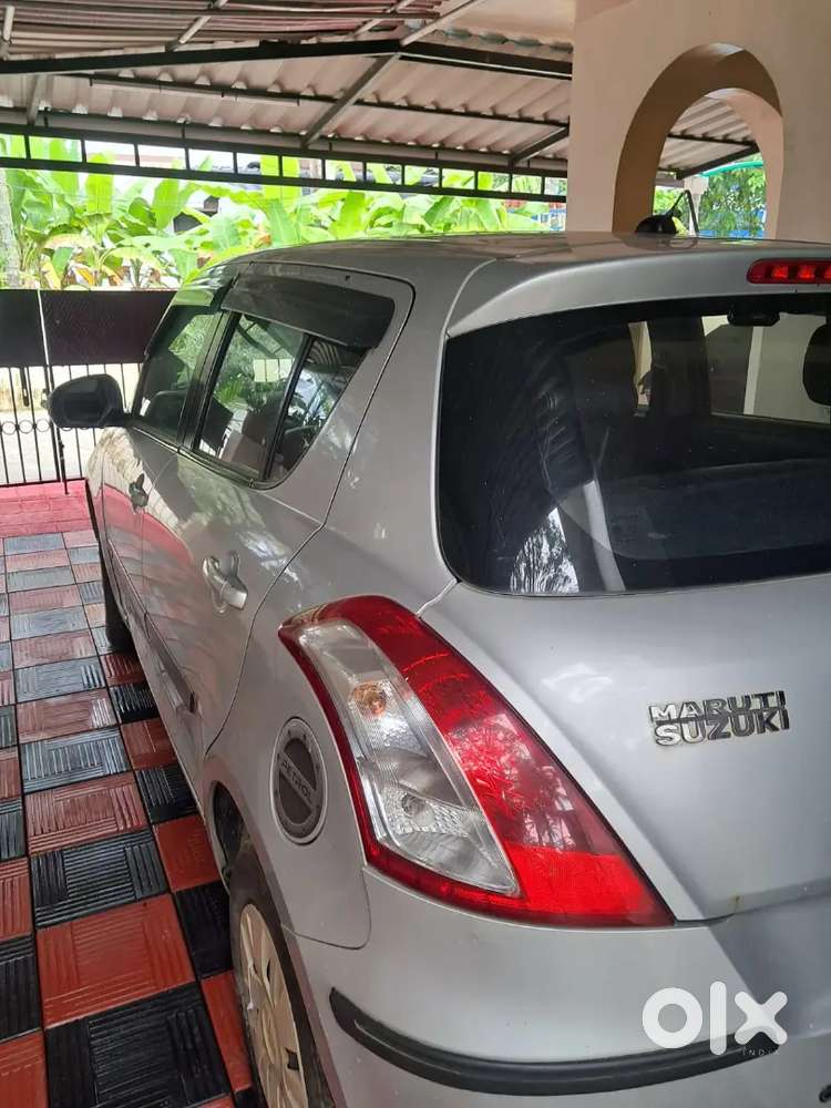 Maruti Suzuki Swift 2013 S Silver Petrol 59000 Km Driven