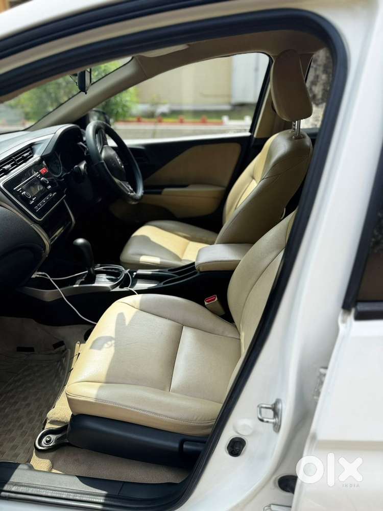 White Honda City - Officer Driven