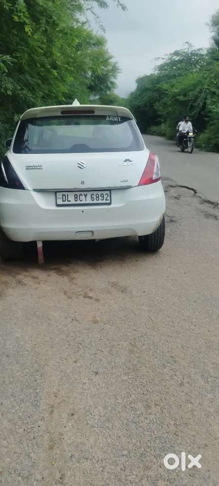 Maruti Suzuki Swift Lxi 2016
