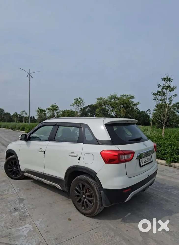 2022 Maruti Suzuki Brezza 1.5 Zxi Plus At Hybrid Dual Tone