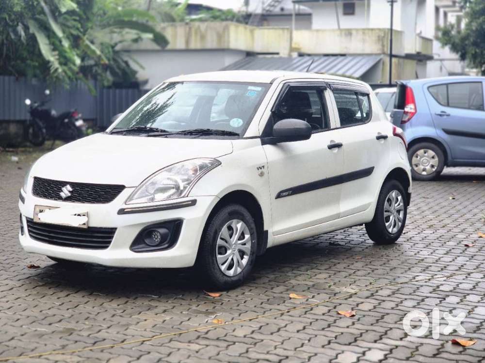 Maruti Suzuki Swift 1.2 Lxi (o), 2015, Petrol
