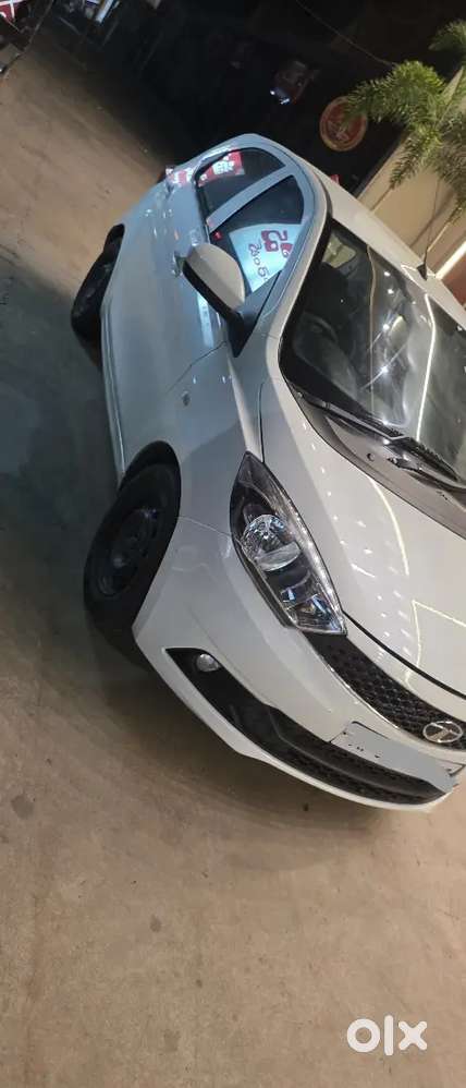 It's Tata Tiago Diesel Excellent Condition With Ceramic Cote