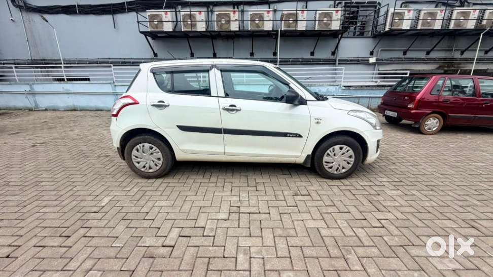 Maruti Suzuki Swift 1.2 Lxi (o), 2016, Petrol