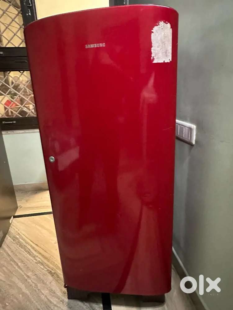 Almost new fridge samsung fridge red color ka freez or old cooler