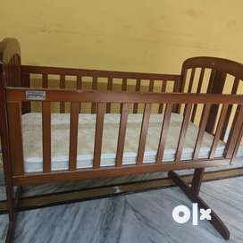 Baby wooden cradle olx best sale