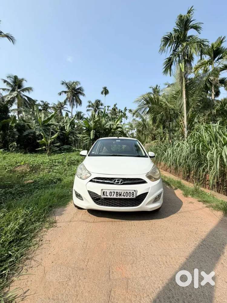 Hyundai Grand I10 2012 Petrol Well Maintained With Sunroof