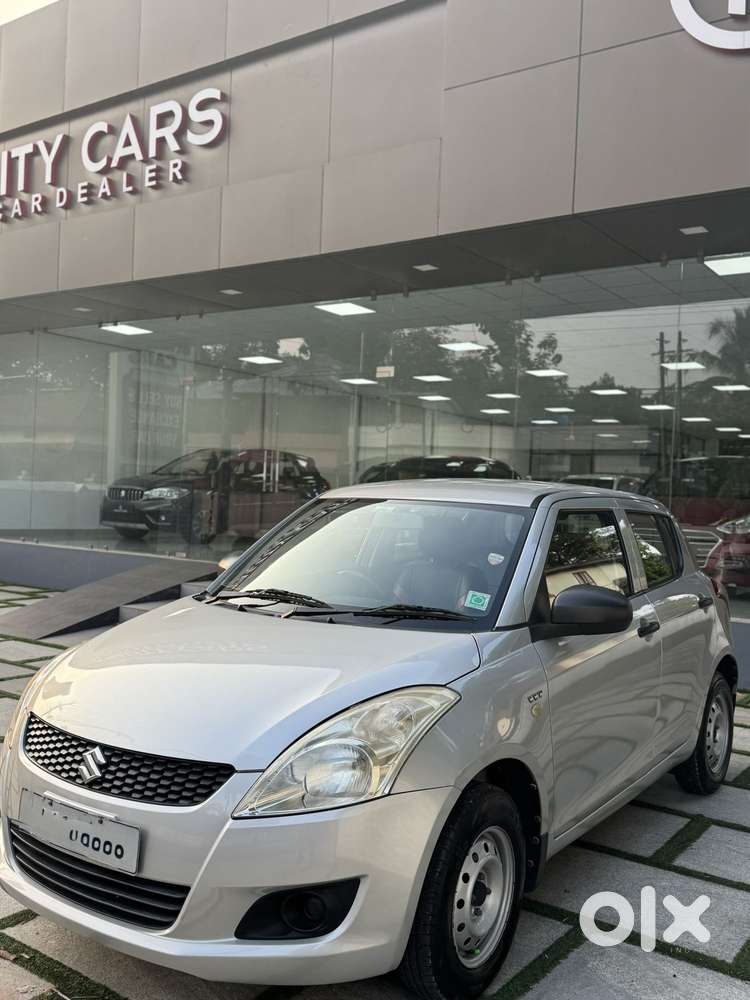 Maruti Suzuki Swift Lxi Optional-o, 2013, Petrol