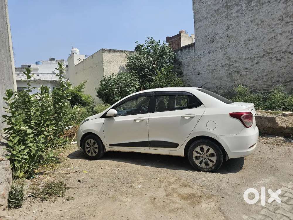 Hyundai Xcent 2015 White Very Good Condition Good Tyres