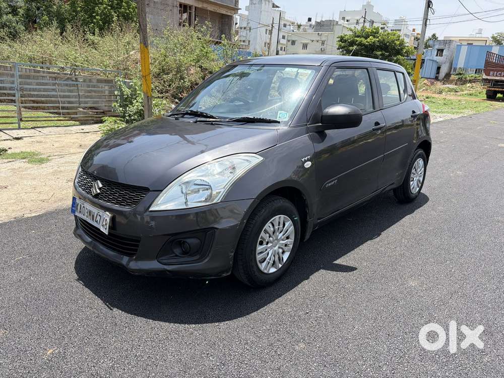 Maruti Suzuki Swift Lxi Optional-o, 2015, Petrol