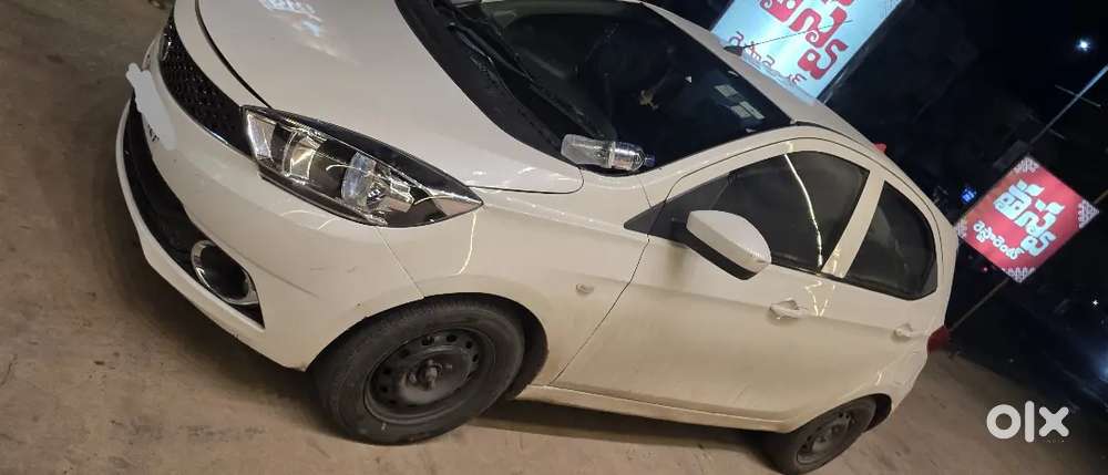 It's Tata Tiago Diesel Excellent Condition With Ceramic Cote