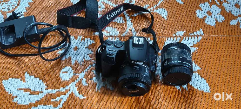 (Canon 200dmark 2with dual lense 18-55mm,0mmprime )excellent condition