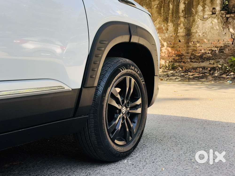 Maruti Suzuki Brezza 1.5 Lxi Smart Hybrid, 2024, Petrol