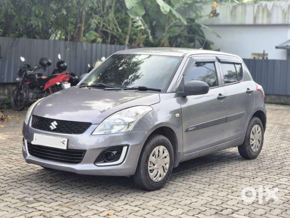 Maruti Suzuki Swift Lxi Optional-o, 2015, Petrol
