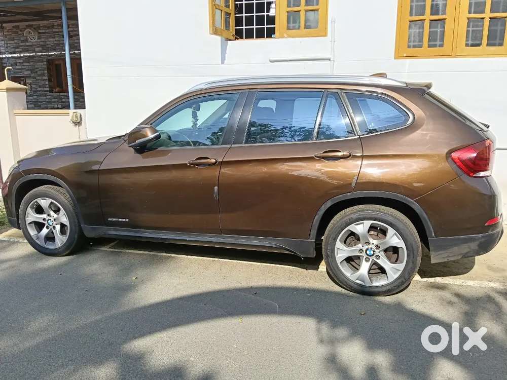 Bmw X1 2015  Rs.12,50,000/-  Registration Brown Colour 2nd Owner