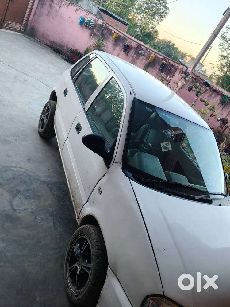 White Colour Zen In Good Condition With Modified Allow Wheel And Tyres