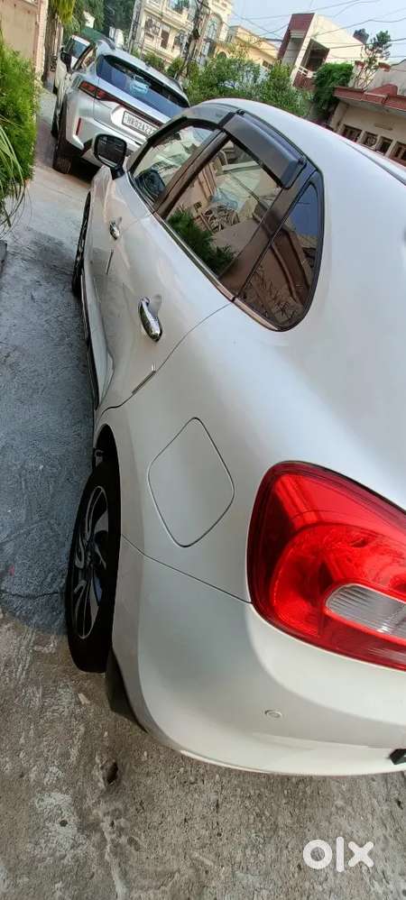 Baleno Zeta White  2019 1 St Owner