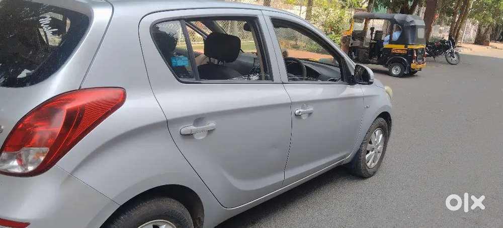 I20, 2nd Owner, Gujrat Registration, Petrol, Sportz ,silver Color,.