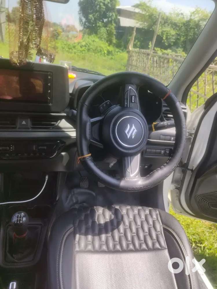 Maruti Suzuki Swift Vxi 2026
