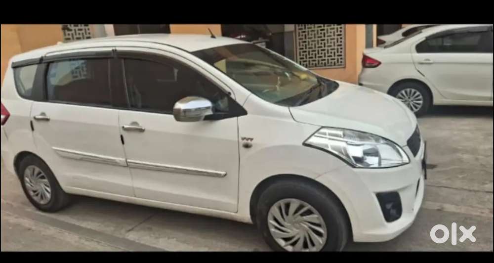 Ertiga Lxi 2013 Model Very Good Condition Cng Fitted Outside