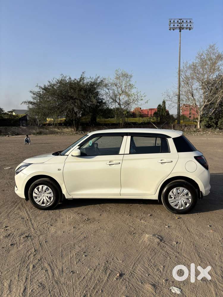 Maruti Suzuki Swift 1.2 Lxi (o), 2024, Petrol