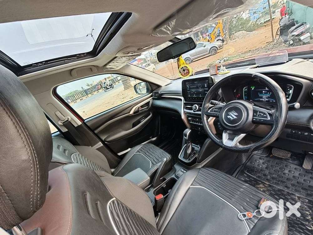 Maruti Suzuki Grand Vitara 1.5 Zeta Plus Dual Tone Intelligent Hybri..
