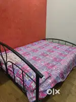 Iron bed with mattress