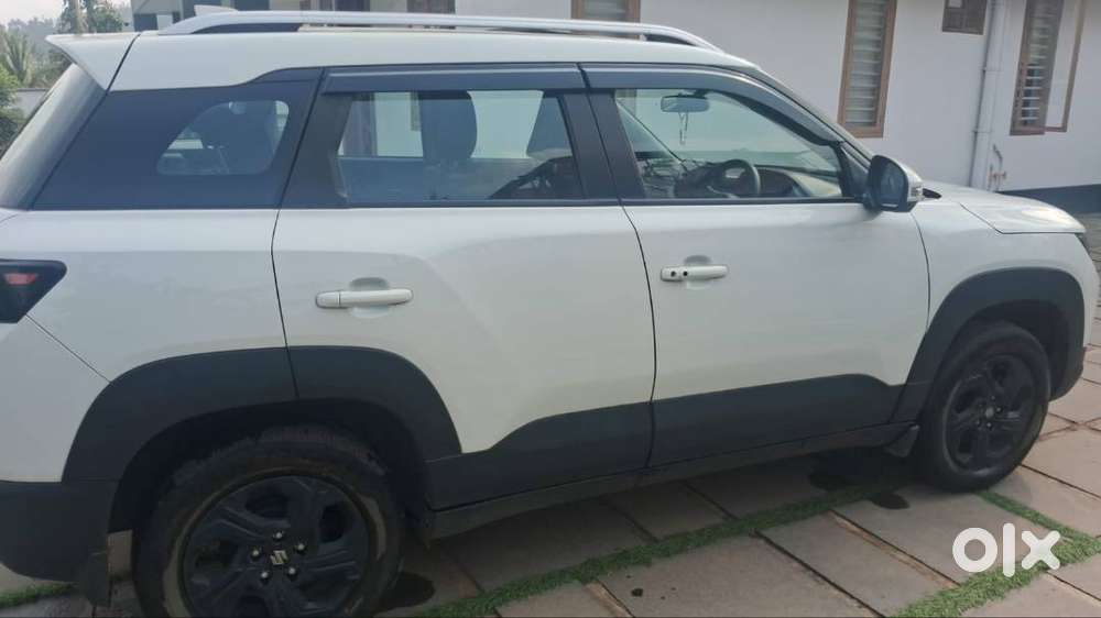 Well Maintained Low Km Driven Good Condition Breeza Automatice