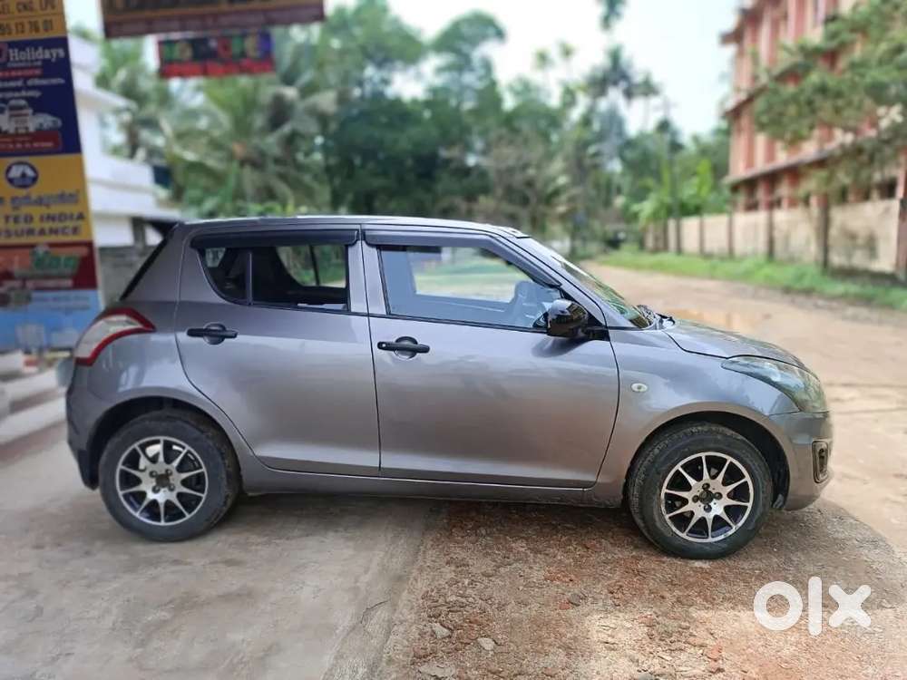 Maruti Suzuki Swift Lxi 2015